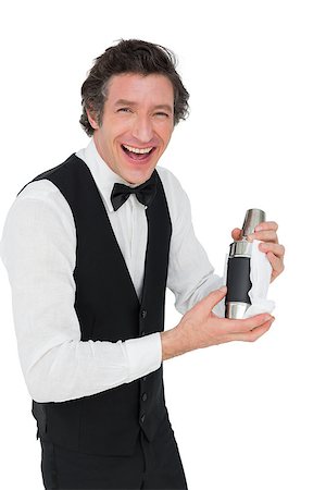 Portrait of happy bartender using cocktail shaker against white background Stock Photo - Budget Royalty-Free & Subscription, Code: 400-07342511