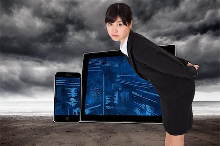photos of ominous sea storms - Serious businesswoman bending against stormy weather by the sea Stock Photo - Budget Royalty-Free & Subscription, Code: 400-07342880