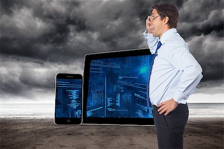 photos of ominous sea storms - Thinking businessman tilting glasses against stormy weather by the sea Stock Photo - Budget Royalty-Free & Subscription, Code: 400-07342882