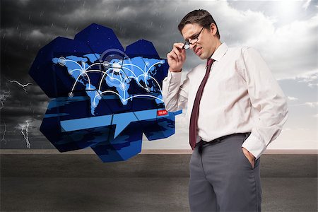 simsearch:614-06044018,k - Thinking businessman touching his glasses against balcony and stormy sky Stock Photo - Budget Royalty-Free & Subscription, Code: 400-07342975