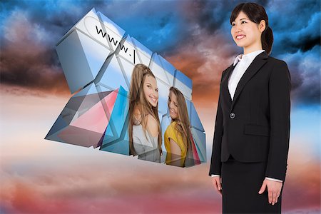 Smiling businesswoman against blue orange cloudy sky background Stock Photo - Budget Royalty-Free & Subscription, Code: 400-07343148