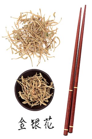simsearch:400-07175956,k - Honeysuckle flowers chinese herbal medicine and chopsticks with mandarin script title translation. Jin yin hua. Lonicera japonica flos. Stock Photo - Budget Royalty-Free & Subscription, Code: 400-07405600
