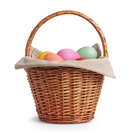 easter basket not people - wicker basket full of pastel colors easter eggs, white background Stock Photo - Budget Royalty-Free & Subscription, Code: 400-07406705
