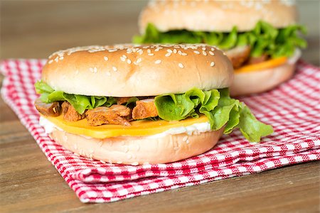 sesame bagel - Bagel with fresh cheese and fresh lettuce on napkin Stock Photo - Budget Royalty-Free & Subscription, Code: 400-07407920
