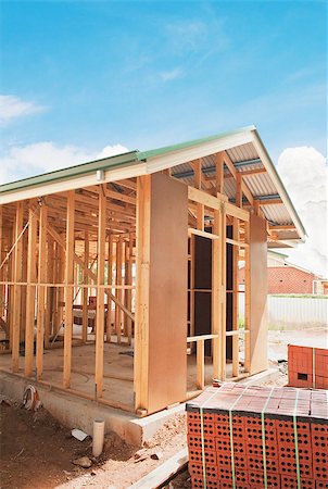 simsearch:400-05344387,k - New residential construction home framing against a blue sky Stock Photo - Budget Royalty-Free & Subscription, Code: 400-07408033