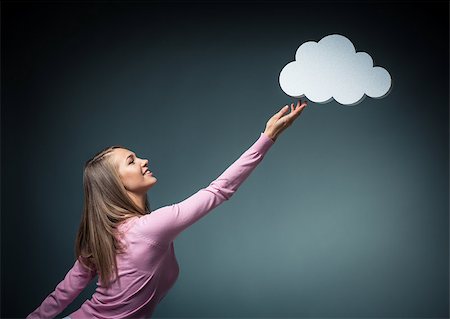 dreaming cloud girl - Smiling attractive girl with bubbles Stock Photo - Budget Royalty-Free & Subscription, Code: 400-07408350