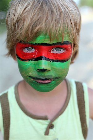 face of carnival - boy child with a painted mask on her face Stock Photo - Budget Royalty-Free & Subscription, Code: 400-07408433