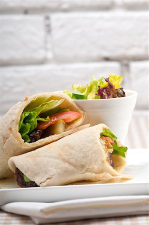 kafta shawarma chicken pita wrap roll sandwich traditional arab mid east food Stock Photo - Budget Royalty-Free & Subscription, Code: 400-07409098