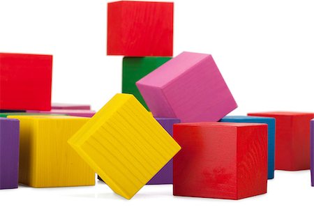 simsearch:400-06527572,k - Wooden blocks, stack of colorful cubes, childrens toy isolated on white background Foto de stock - Super Valor sin royalties y Suscripción, Código: 400-07409283