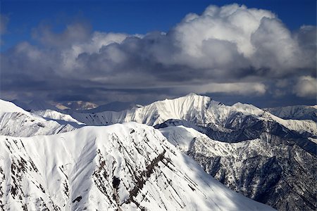 simsearch:400-08530488,k - Snowy ridges with trace from avalanche. Caucasus Mountains, Georgia. Ski resort Gudauri Stock Photo - Budget Royalty-Free & Subscription, Code: 400-07409302