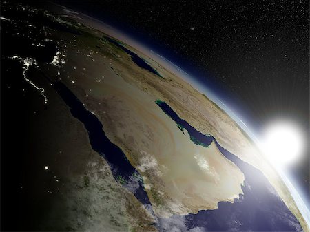 Sunrise over Arabian peninsula viewed from space. Highly detailed planet surface with clouds and city lights. Elements of this image furnished by NASA. Stock Photo - Budget Royalty-Free & Subscription, Code: 400-07409883