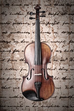 simsearch:400-04794660,k - Violin on an antique texture background Foto de stock - Royalty-Free Super Valor e Assinatura, Número: 400-07414194