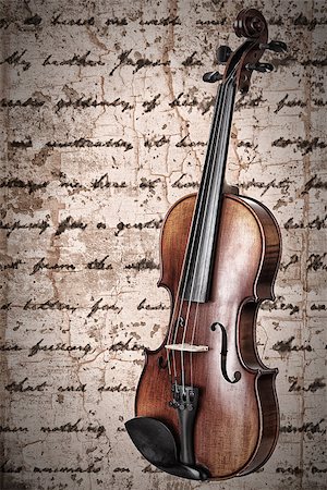 Violin on an antique texture background Stock Photo - Budget Royalty-Free & Subscription, Code: 400-07414195