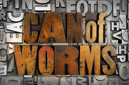 simsearch:400-07416672,k - Thw words CAN OF WORMS written in vintage letterpress type Photographie de stock - Aubaine LD & Abonnement, Code: 400-07414774