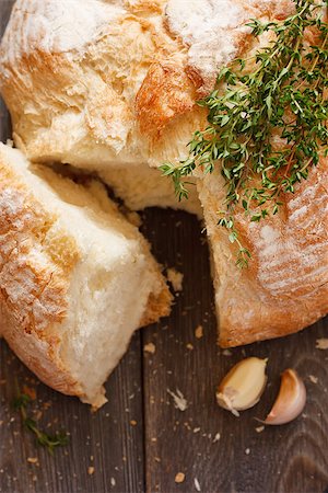 simsearch:400-07219392,k - Fresh bread with thyme and garlic close-up. Stock Photo - Budget Royalty-Free & Subscription, Code: 400-07414817