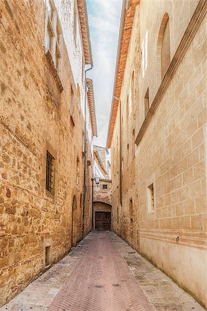 simsearch:400-07212378,k - Narrow street of Pienza in Tuscany, Italia, Europe Foto de stock - Royalty-Free Super Valor e Assinatura, Número: 400-07415190