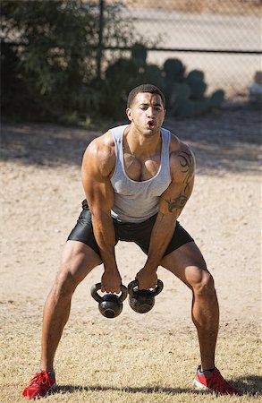 People exercising in outdoor bootcamp Stock Photo - Budget Royalty-Free & Subscription, Code: 400-07416045