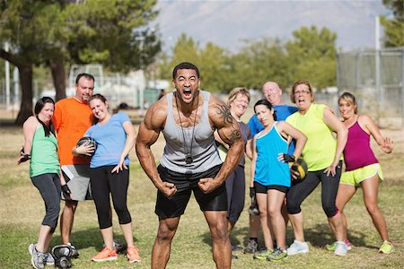 Loud boot camp fitness trainer and scared group Stock Photo - Budget Royalty-Free & Subscription, Code: 400-07416050