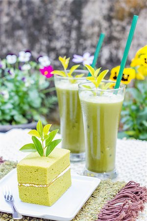 Green tea cake and a glass of Ice Green tea as background. Stockbilder - Microstock & Abonnement, Bildnummer: 400-07416341