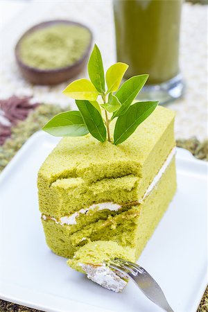 Green tea cake and a glass of Ice Green tea as background. Stockbilder - Microstock & Abonnement, Bildnummer: 400-07416342