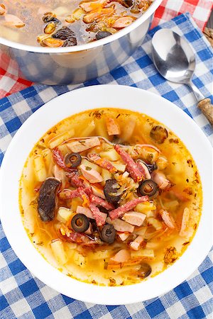 stew sausage - Traditional tasty russian Soljanka soup in a bowl Stock Photo - Budget Royalty-Free & Subscription, Code: 400-07416435