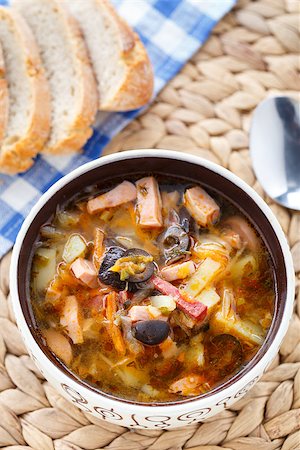 stew sausage - Traditional tasty russian Soljanka soup in a bowl Stock Photo - Budget Royalty-Free & Subscription, Code: 400-07416438