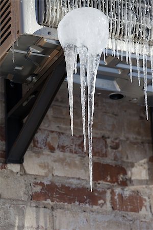 simsearch:400-08573713,k - Icicle on icy air conditioner Photographie de stock - Aubaine LD & Abonnement, Code: 400-07416863