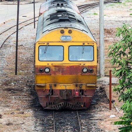 simsearch:400-07417657,k - Old diesel locomotive in the maintenance area of railway station. Fotografie stock - Microstock e Abbonamento, Codice: 400-07416996