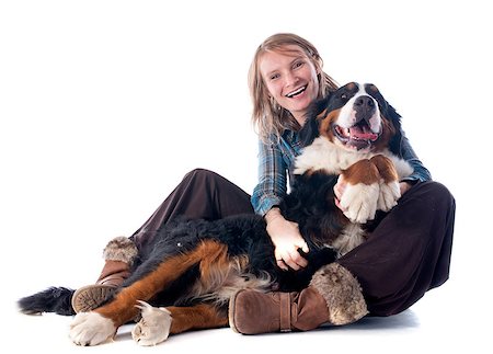 woman and her bernese mountain dog in front of white background Foto de stock - Super Valor sin royalties y Suscripción, Código: 400-07417357