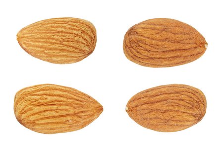 simsearch:400-08695656,k - four almond nuts, isolated on white background Foto de stock - Super Valor sin royalties y Suscripción, Código: 400-07417533