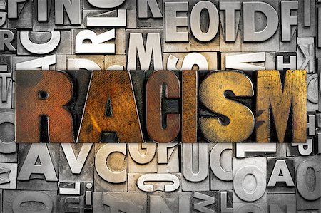 The word RACISM written in vintage letterpress type Stockbilder - Microstock & Abonnement, Bildnummer: 400-07418022