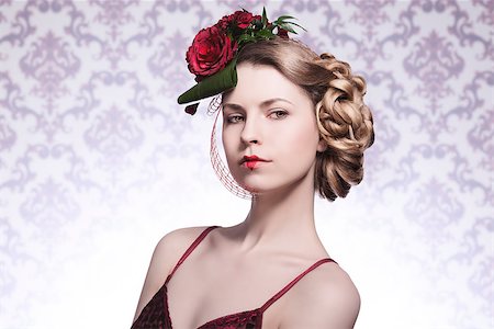 close-up portrait of sexy fashion blonde girl posing with elegant romantic hair-style with red roses, red sexy dress and heart shaped lipstick Stock Photo - Budget Royalty-Free & Subscription, Code: 400-07418085