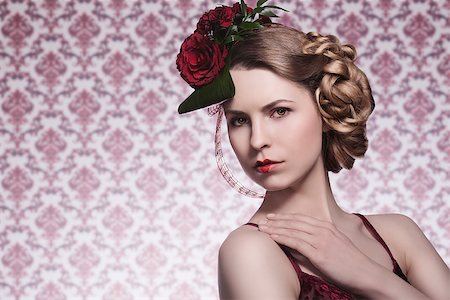 elegant pretty girl with creative romantic hair-style, red roses on her head, sexy red dress and heart shaped lipstick Stock Photo - Budget Royalty-Free & Subscription, Code: 400-07418086