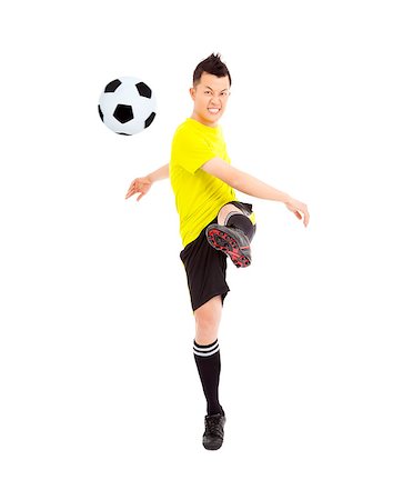 socks feet - soccer player shooting a ball Stock Photo - Budget Royalty-Free & Subscription, Code: 400-07418341