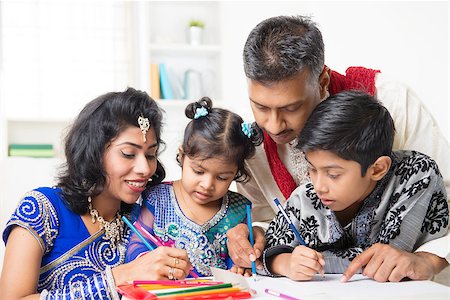 Asian Indian family drawing and painting picture at home. India family lifestyle. Happy parents and children having fun. Stock Photo - Budget Royalty-Free & Subscription, Code: 400-07418396