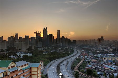 elevated train - Ampang Kuala Lumpur Elevated Highway AKLEH with City Skyline in Malaysia at Sunset Stock Photo - Budget Royalty-Free & Subscription, Code: 400-07419001