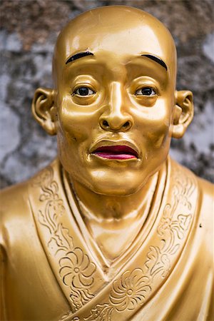 simsearch:400-06855214,k - Buddha statue at Ten Thousand Buddhas Monastery in Hong Kong, China. Foto de stock - Super Valor sin royalties y Suscripción, Código: 400-07419159