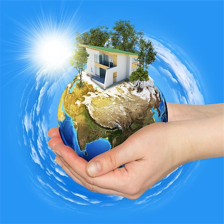 future protections to earth - Hands holding earth. Blue sky on background Stock Photo - Budget Royalty-Free & Subscription, Code: 400-07419662