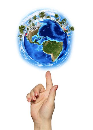 future protections to earth - Hand goes to the planet Earth. Isolated on white background Stock Photo - Budget Royalty-Free & Subscription, Code: 400-07419728