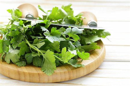 simsearch:400-05381074,k - Fresh fragrant green parsley on a cutting board Stock Photo - Budget Royalty-Free & Subscription, Code: 400-07419784