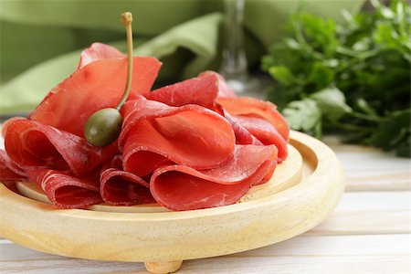 simsearch:400-06063216,k - Smoked meat bresaola snack on a cutting board Fotografie stock - Microstock e Abbonamento, Codice: 400-07410437