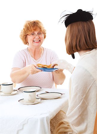 Mother and her teen daughter enjoyin a tea party together. Stock Photo - Budget Royalty-Free & Subscription, Code: 400-07411044