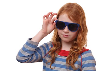 simsearch:400-08336541,k - Portrait of a red-haired young girl wearing sunglasses on white background Photographie de stock - Aubaine LD & Abonnement, Code: 400-07411164