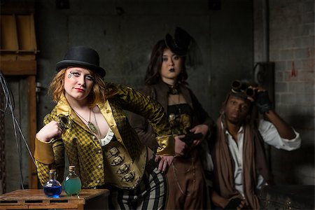 Three Steampunks with in Retro Lab with Potions Stock Photo - Budget Royalty-Free & Subscription, Code: 400-07412232