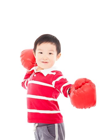 Portrait of a cute sporty boy in boxing gloves Stock Photo - Budget Royalty-Free & Subscription, Code: 400-07412746