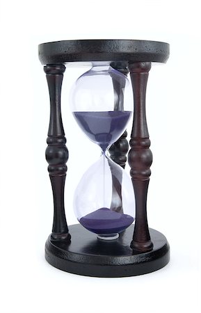 Old-fashioned hourglass isolated on white Fotografie stock - Microstock e Abbonamento, Codice: 400-07412867