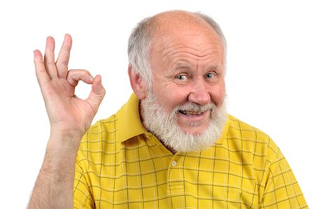 simsearch:400-04485729,k - senior funny bald man in yellow t-shirt is shows gestures and grimaces Stock Photo - Budget Royalty-Free & Subscription, Code: 400-07424115