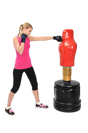 punching bag - Young Boxing Lady with Body Opponent Bag, Adjustable Practice Mannequin Stock Photo - Budget Royalty-Free & Subscription, Code: 400-07424140