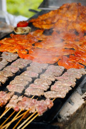 Cooking meat. Summer cook-out. Food service Stock Photo - Budget Royalty-Free & Subscription, Code: 400-07424723