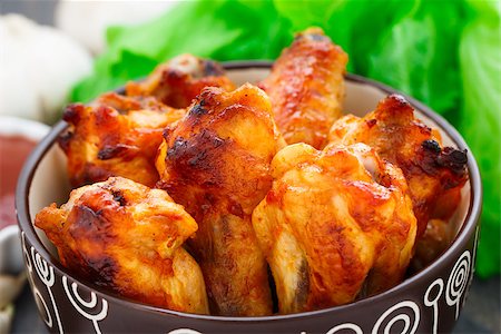 simsearch:400-05708291,k - Delicious baked chicken wings in a bowl Stock Photo - Budget Royalty-Free & Subscription, Code: 400-07425445